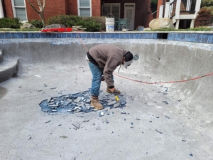 Pool renovation old plaster removal